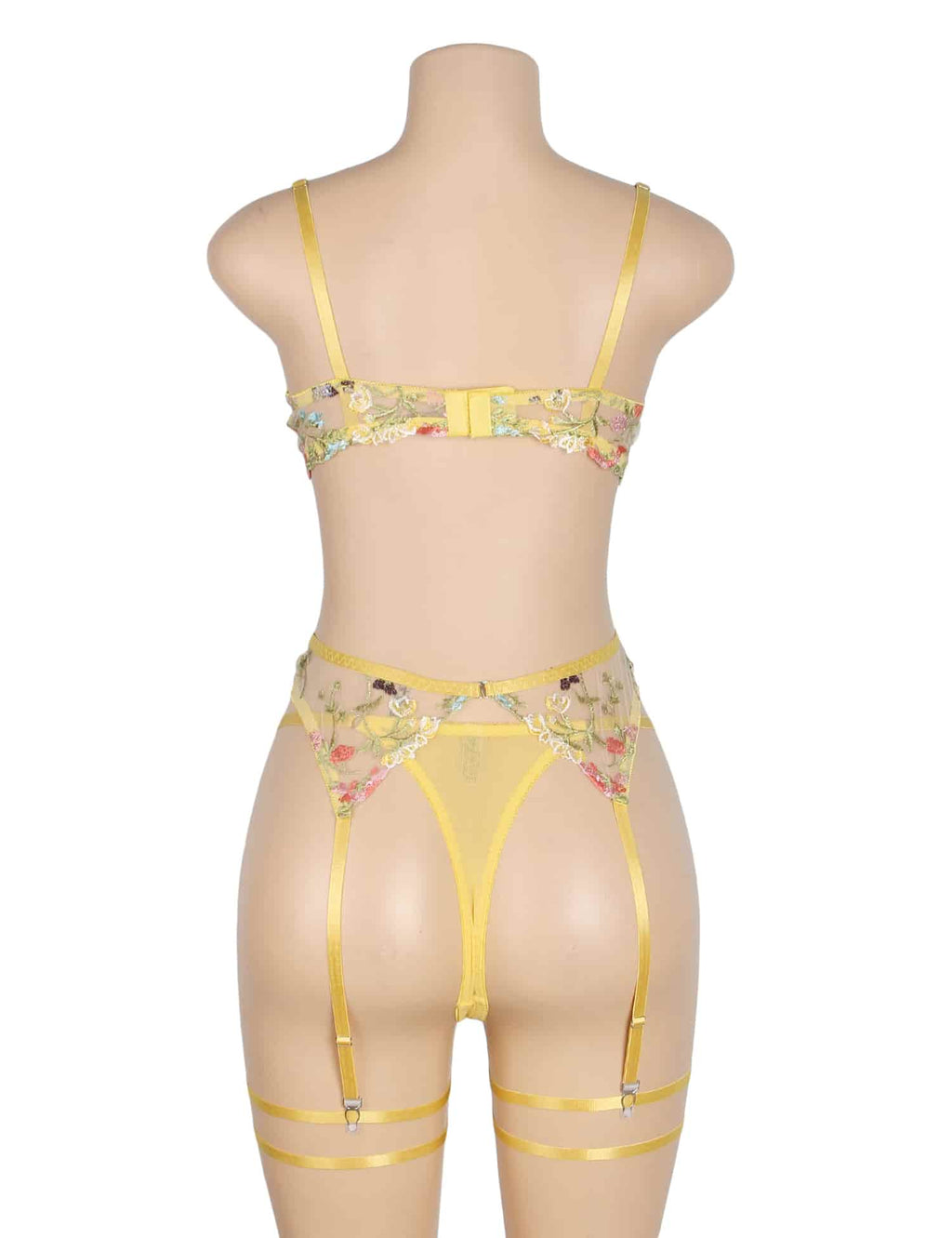 Back view of canary yellow floral sexy lingerie set with adjustable hook closure, sheer mesh briefs, garters, and leg loops