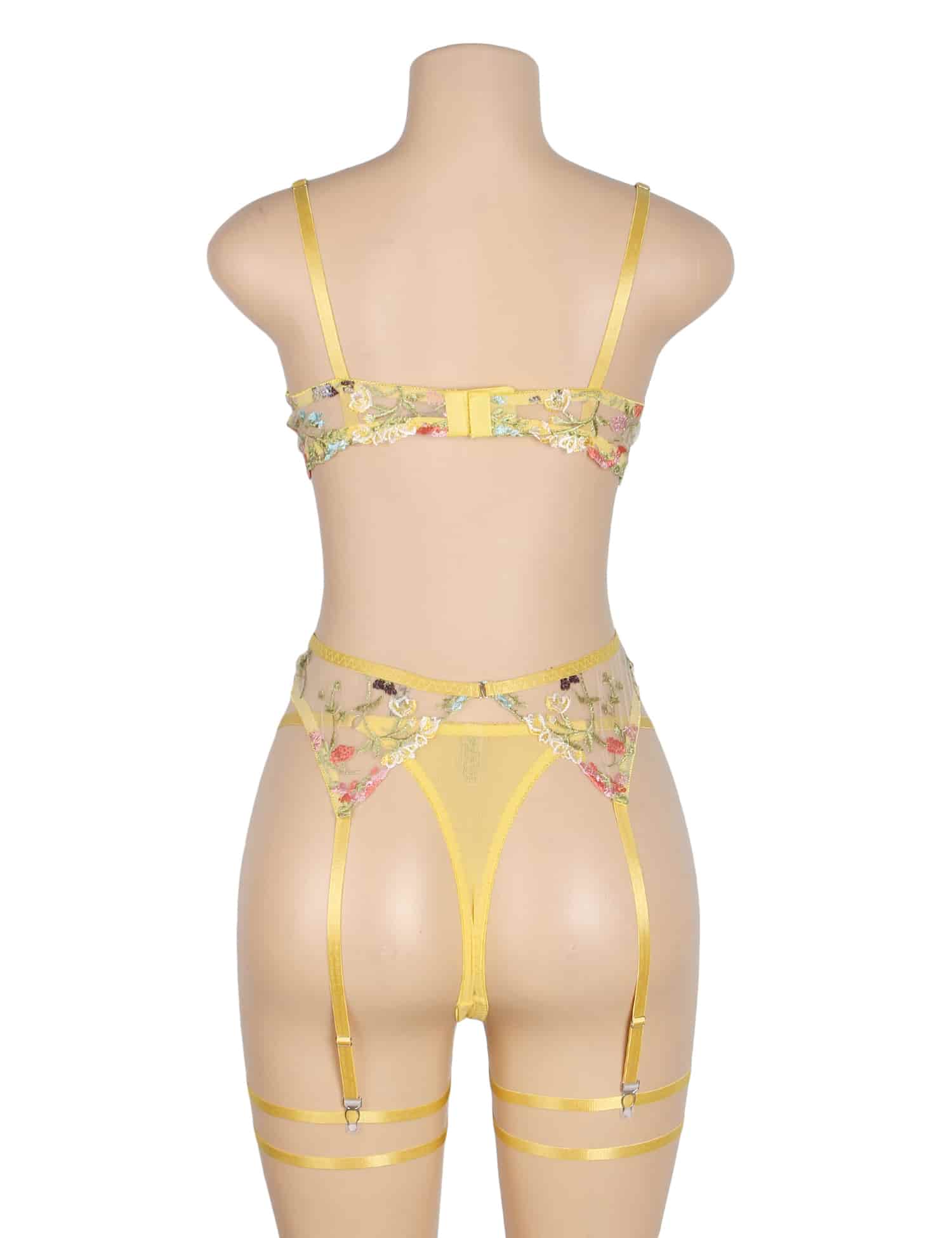 Back view of canary yellow floral sexy lingerie set with adjustable hook closure, sheer mesh briefs, garters, and leg loops