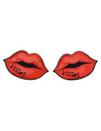 Red lip pasties with 'kisses' text on a white background