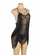 Angled view of black tassel lingerie dress with layered fringe detailing, low-cut neckline, and fluid silhouette